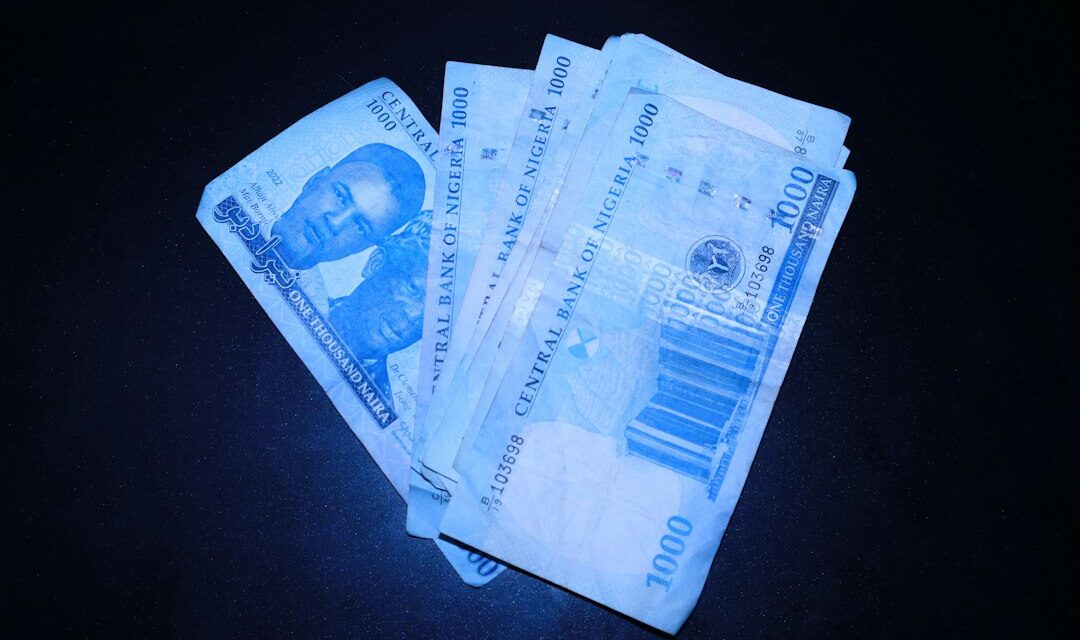 A bunch of money sitting on top of a table