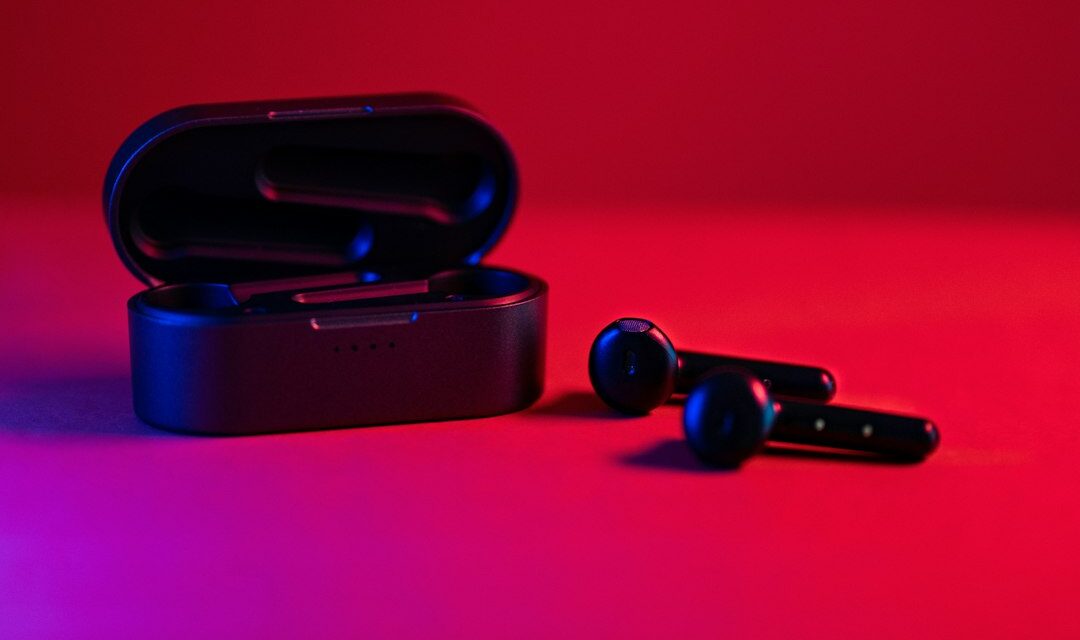Black and blue bluetooth earbuds