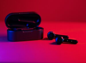 Black and blue bluetooth earbuds