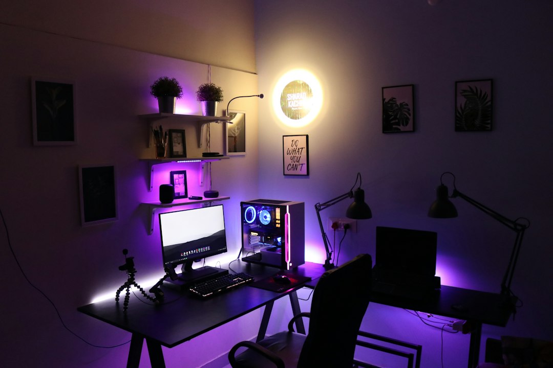 Black laptop computer on table