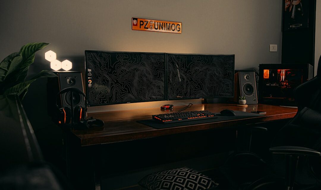 Black flat screen computer monitor on brown wooden desk
