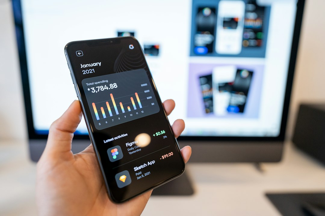 Person holding black android smartphone