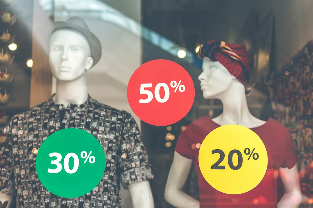 Two male and female mannequin wearing clothes