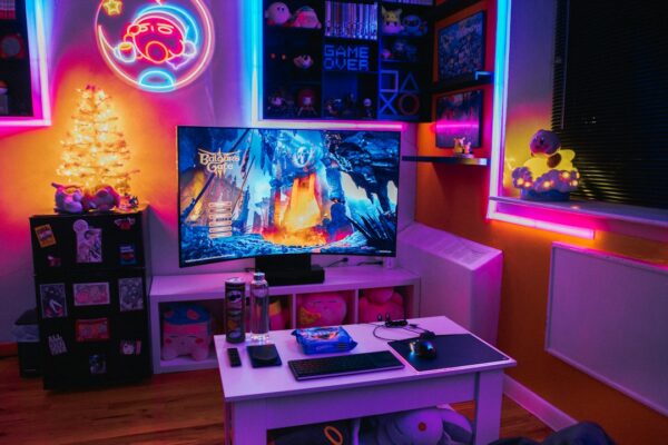 A living room with a television and a game system