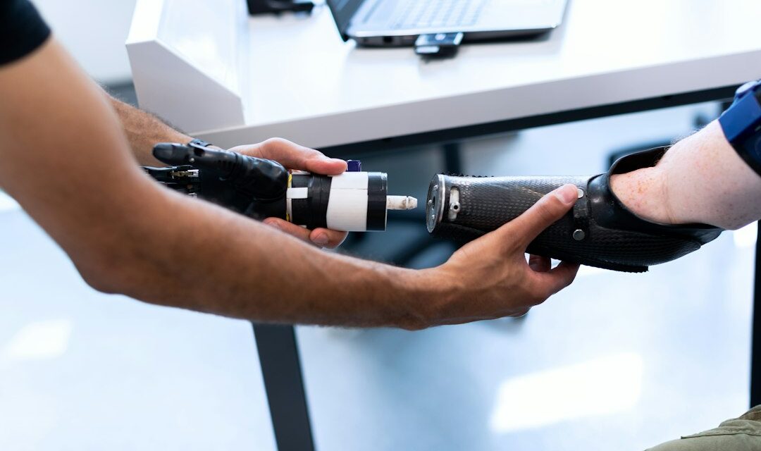 Person holding black and silver flashlight