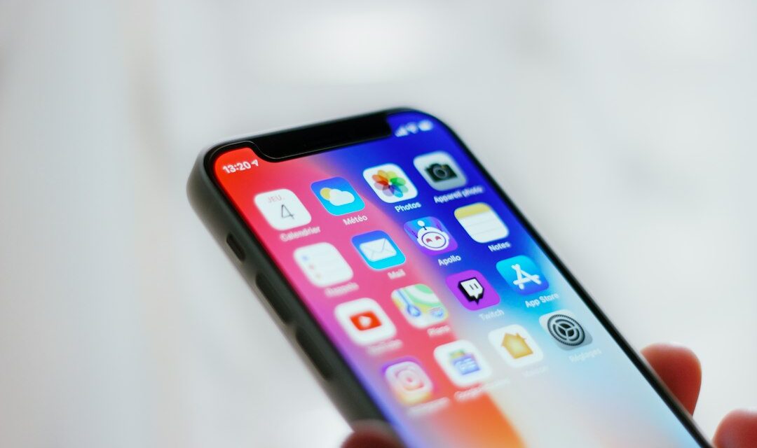 Person holding black iphone 4