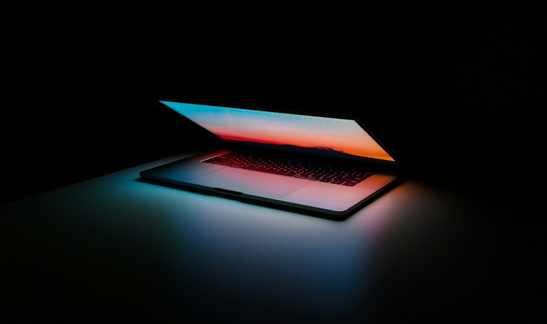 Gray and black laptop computer on surface