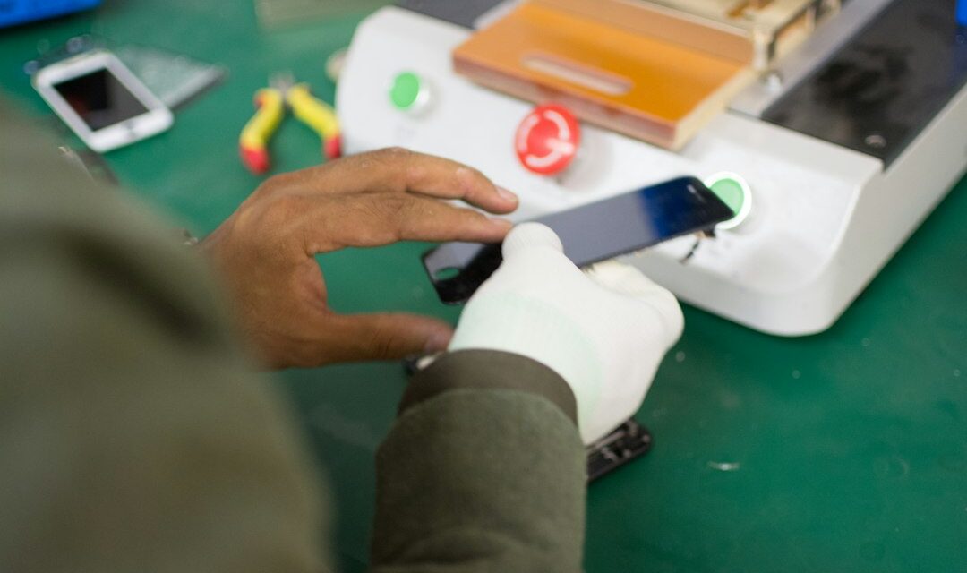Person holding smartphone screen