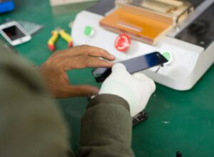 Person holding smartphone screen