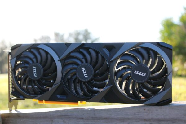 A black graphics card with three fans