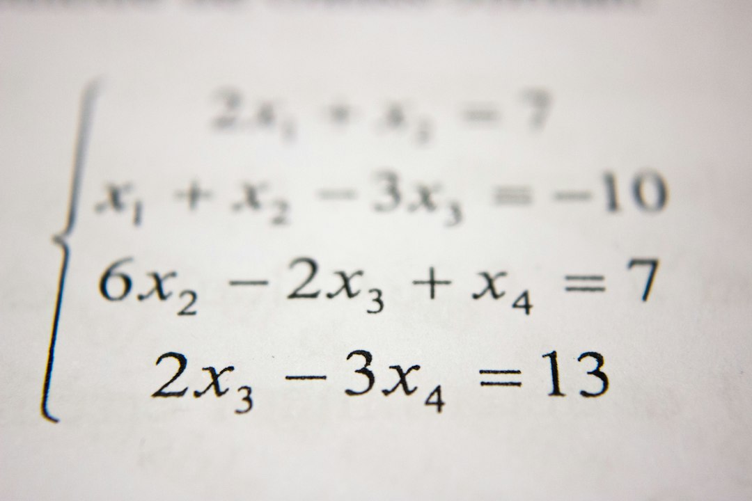 A system of linear equations printed in black ink on white paper