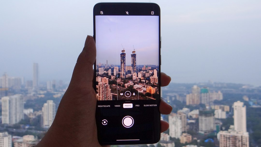 A person taking a picture of a city