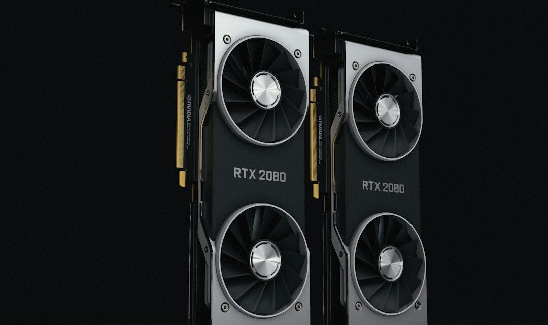 A pair of black and silver graphics cards