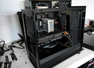 Black computer tower on white table