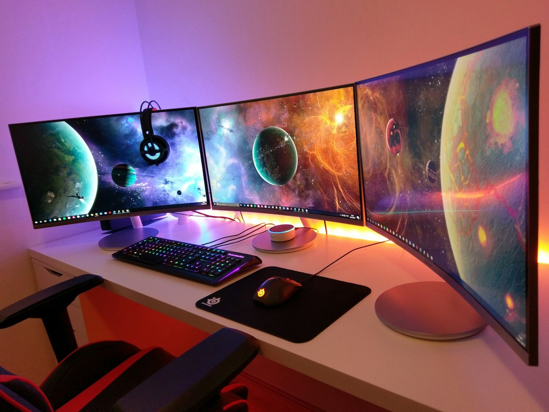 Black computer keyboard on brown wooden desk