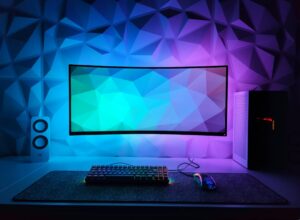 A computer monitor sitting on top of a desk