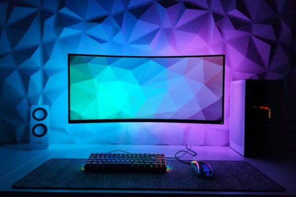 A computer monitor sitting on top of a desk
