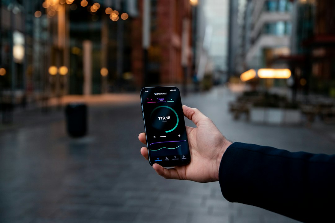 Person holding black smartphone during daytime