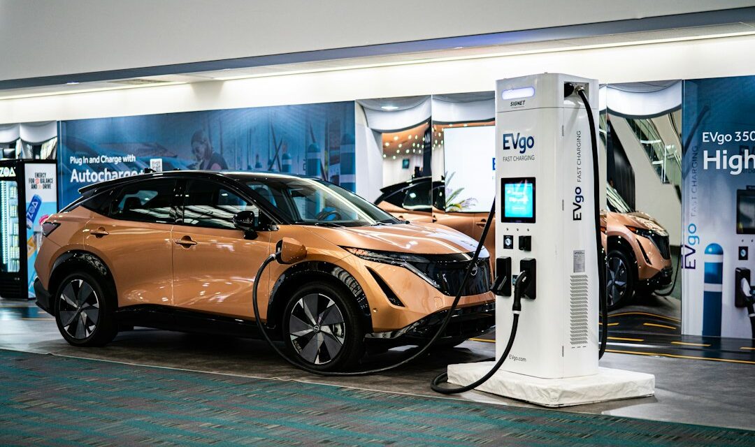 An electric car plugged into a charging station