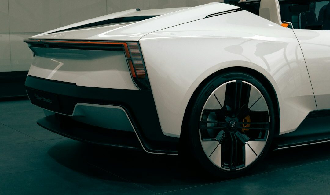 Sleek white convertible sports car rear view