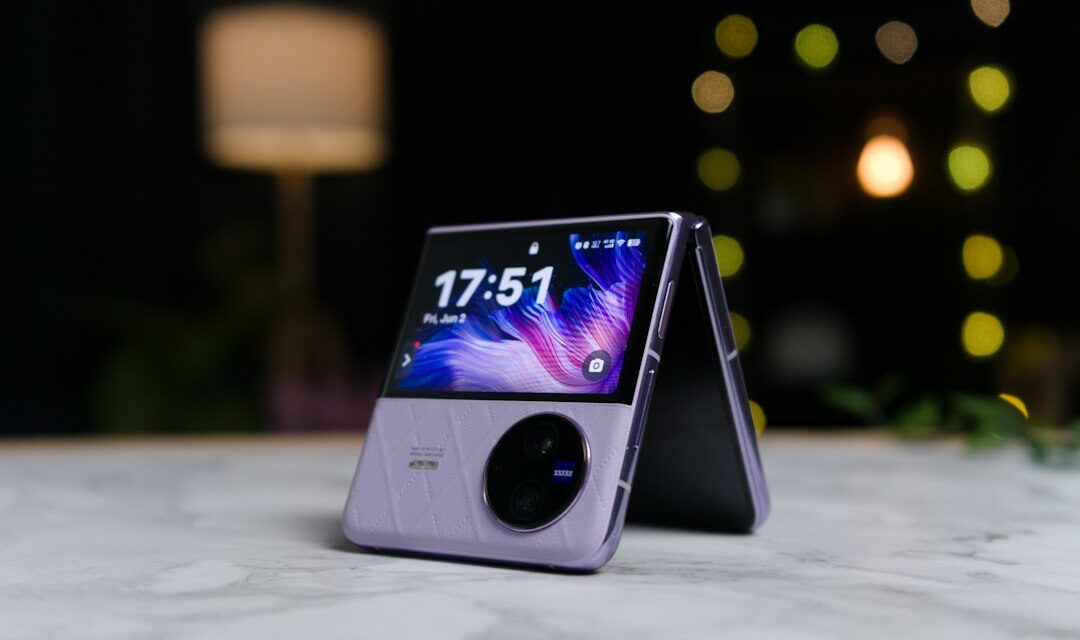 A cell phone sitting on top of a table
